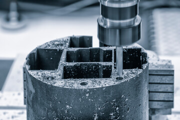 CNC modern milling machine produces a metal detail