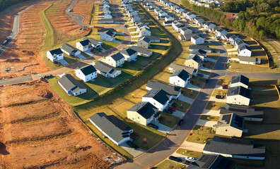 Aerial view of construction site with new tightly packed homes in South Carolina. Family houses as example of real estate development in american suburbs