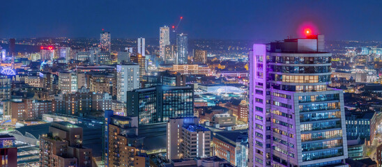 Leeds West Yorkshire aerial view of the city centre at night looking north from near the train station - obrazy, fototapety, plakaty