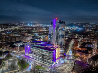 Leeds West Yorkshire aerial view of the city centre at night looking north from near the train station
