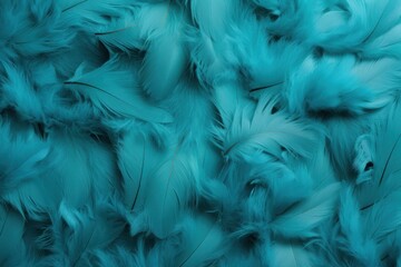  a bunch of blue feathers that are all over the surface of a bed of blue feathers that are all over the surface of a bed of blue feathers that are all over the bed.