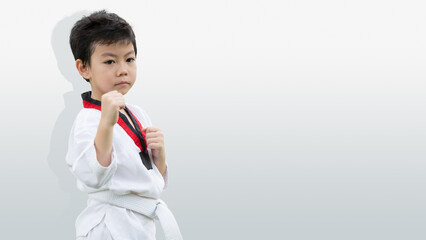 Taekwondo kid kick boxing, Boy fighter fighting stand isolated with white space for text