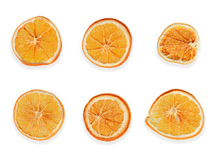 sliced dried oranges on a white isolated background close up