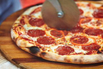 Cooking pizza in a pizzeria or restaurant