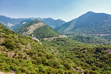 Obraz premium Old abandoned stone tower at the top of a hill in Mani Peninsula, Peloponnese