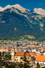 Naklejka na ściany i meble Alpine summer view with the famous Nordkette mountains in the background at Innsbruck, Tyrol, Austria