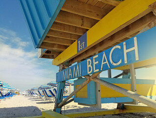 Lifeguard station and lounge chairs on the beach in Miami South Beach