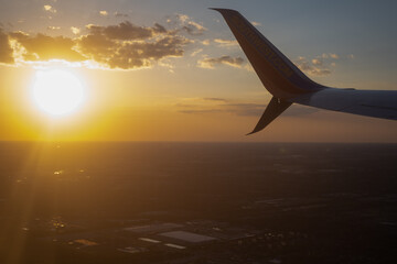 airplane flying over the ocean