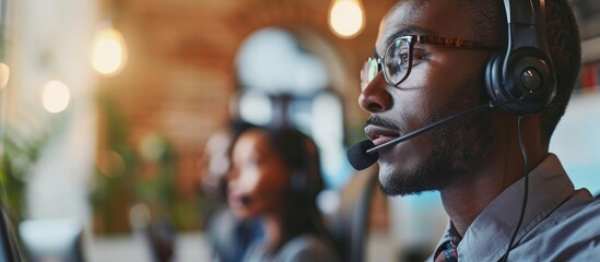 Office workers in headsets offering remote assistance to customers or colleagues through phone calls, video conferences, or online meetings. - obrazy, fototapety, plakaty