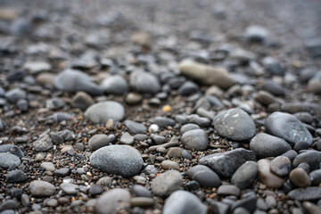 Medium sized pebbles in a narrow depth of field