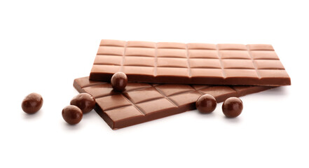 Tasty chocolate bars and candies on white background