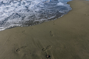 footprints of a woman on the beach of the Mediterranean Sea2