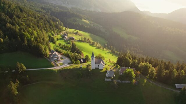 Aerial view of the beautiful Slovenian Alpine landscape with St Spirit church