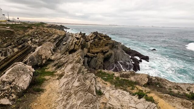 rocky cliffs on the Atlantic coast at Baleal peninsula, Ferrel, municipality of Peniche, district of Leiria, Portugal