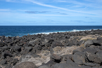 Fototapeta na wymiar Volcanic rocks on the coast, Lanzarote, Spain