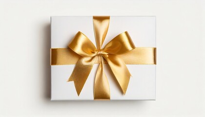 Fototapeta na wymiar blank gift card with golden bow isolated on white top view