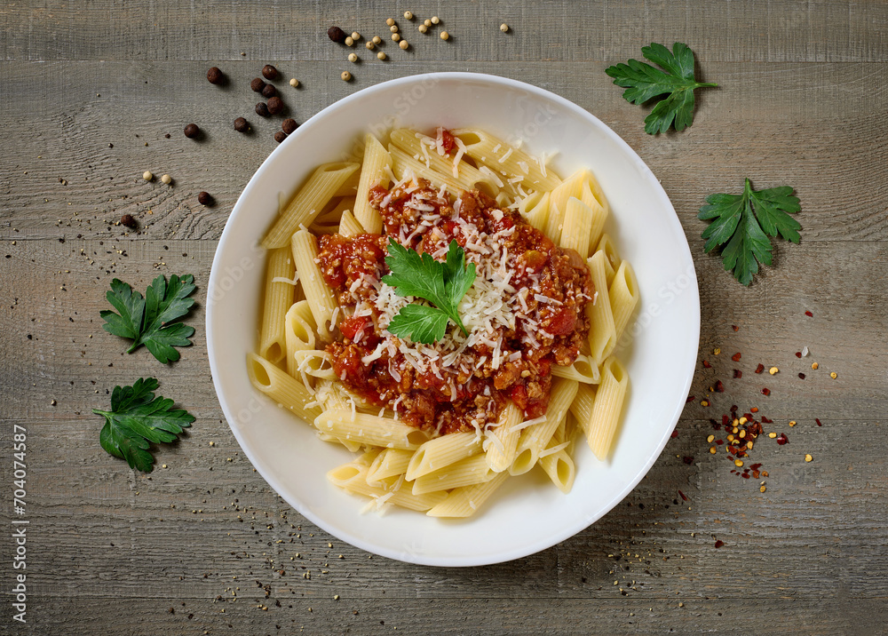 Sticker plate of pasta bolognese