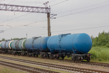 Fototapeta na wymiar Train consisting of tanks with fuel at the station