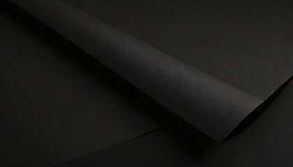 close up of a sheet of black paper with folds - obrazy, fototapety, plakaty