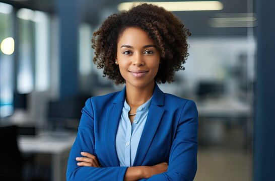 Happy young african american woman business professional in office smiling