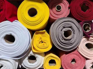 Samples of cloth and fabrics in different colors found at a fabrics market