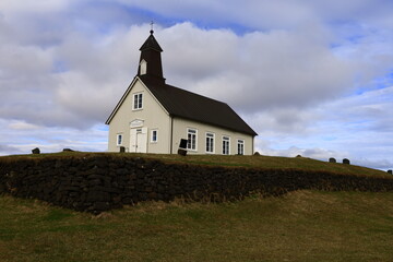 Fototapeta na wymiar Strandarkirkja is a Lutheran parish church in Selvogur on the southern coast of Iceland
