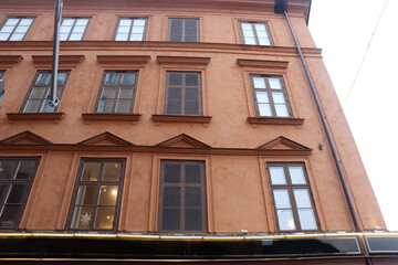 Painted windows on the facade of a building in Stockholm