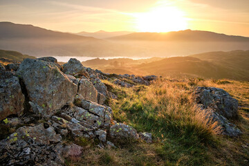 Sunrise from Loughrigg Fell looking over to Wansfell Pike. A cloud inversion lies above Ambleside...
