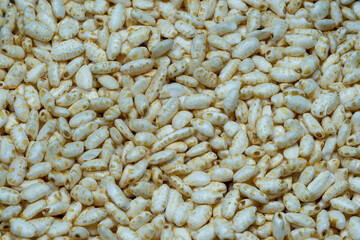 macrophotography of several puffed rice grains.
