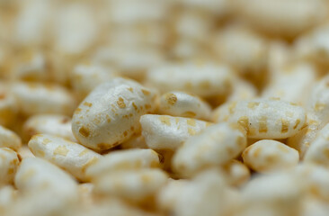 macrophotography of several puffed rice grains.
