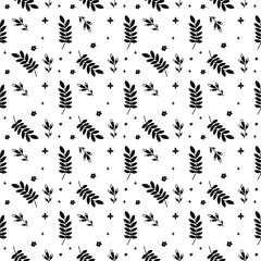 Cute floral hand draw pattern. Seamless leaves texture. An elegant template for fashionable prints. Print with black flowers and leaves, dots. white background.perfect for scrapbook, print, textile 