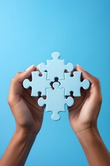 Four puzzle pieces coming together to complete the puzzle,