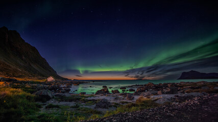 Aurora Borealis on sky in Lofoten Islands