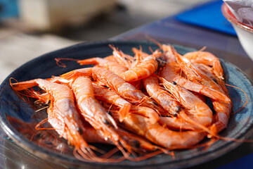 Close up of Spanish very popular tapas, Gambas de Huelva ( shrimps from Huelva in Spain) - obrazy, fototapety, plakaty