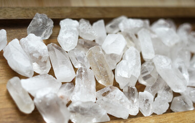 Mountain crystals on the wooden background. 