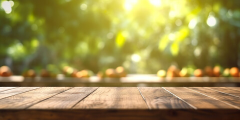 Empty wooden table with fruit trees in the background