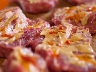 Raw meat with sauce - 704117955
