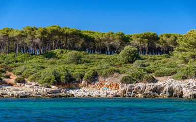 Small solitary beach near Alghero in northwest Sardinia