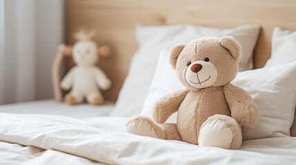 A cute teddy bear sitting on a bed - obrazy, fototapety, plakaty