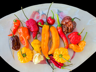 Collection of different types of small hot peppers