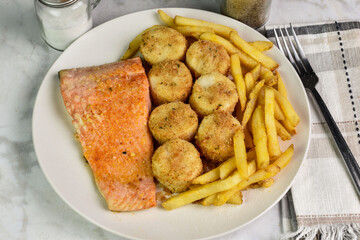 seasoned salmon with scallops and  fries