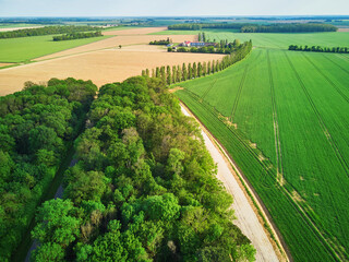 Aerial drone view of green fields and meadows in Yveliness,, near Paris, France - obrazy, fototapety, plakaty