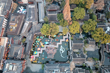 High angle view of Yuyuan garden in Shanghai downtown district, colorful dragon lanterns for...