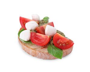 Delicious Caprese sandwich with mozzarella, tomatoes, basil and pesto sauce isolated on white