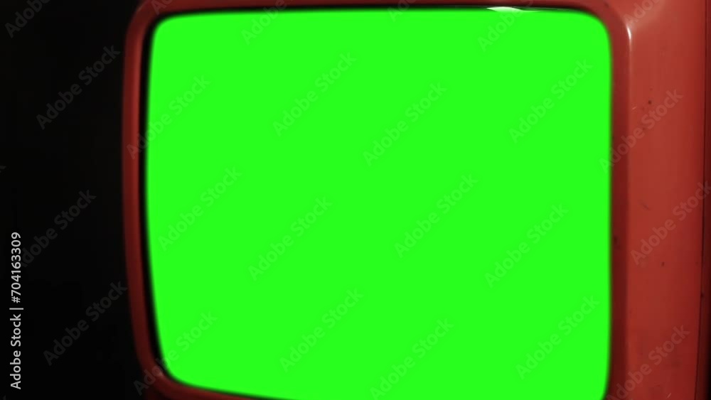 Wall mural retro television turning on green screen with static noise. you can replace green screen with the fo
