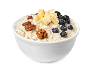 Tasty boiled oatmeal with blueberries, banana and nuts in bowl isolated on white