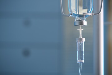 IV drip against blurred background, space for text