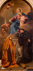 VICENZA, ITALY - NOVEMBER 5, 2023: The painting of Madonna with the St. Nicholas Tolentino and Nicholas of Bari in the Cathedral by Giambattista Pittoni (1744).