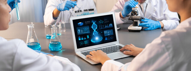 Dedicated scientist group working on advance biotechnology computer software to study or analyze...