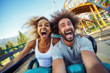 Fotobehang Couple having fun on a roller coaster © duyina1990